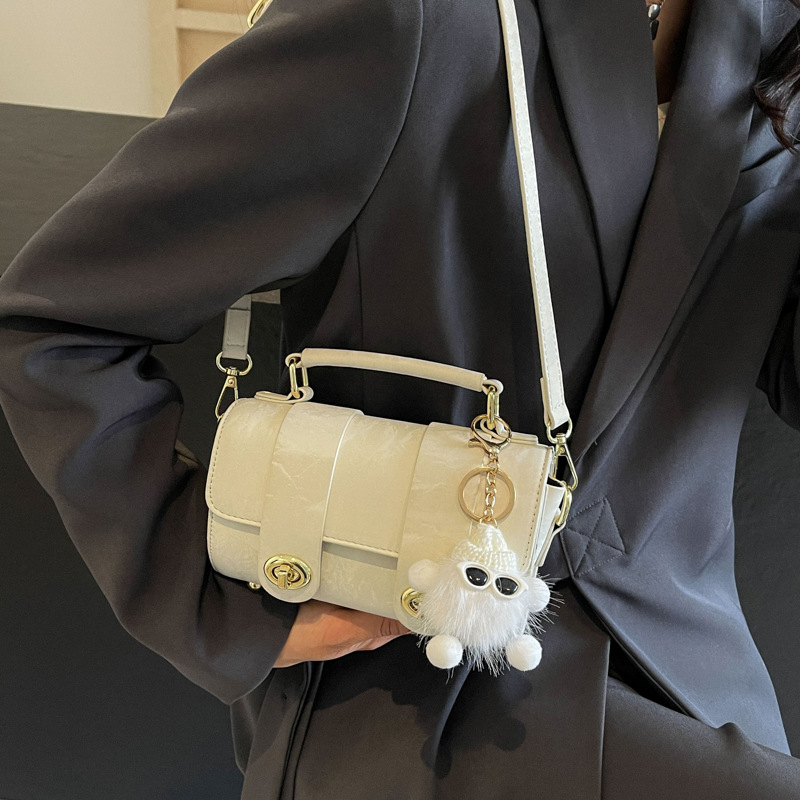 Bolso popular de este año para mujeres 2024 primavera y verano nuevo estilo de alta sensación bolso portátil cuadrado de moda universal bolso de hombro coreano