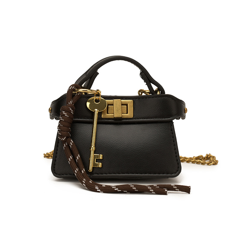 Coreano simple bolso de niña de color sólido mini bolso de bebé 2026 bolso para niños de comercio exterior transfronterizo