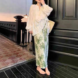 2025夏季温柔时尚穿搭女款半身裙A字裙绿色印花清新文艺设计显瘦