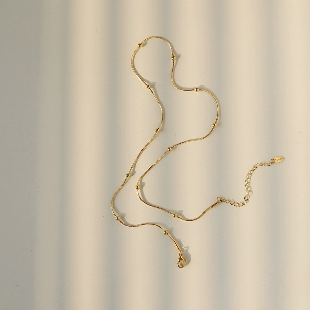 Collier cubain rétro haut de gamme en acier titane, style européen et américain, orné d'une pierre de zircon vert, à porter en niche de clavicule._voghion.com