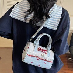 クロスボーダー甘いリボン脇の下バッグ女性の新しいトレンディなファッション水玉キャンバスバッグニッチショルダーハンドバッグ