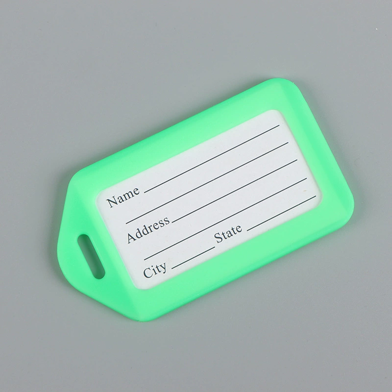 Plastic luggage tag, suitcase, airplane
