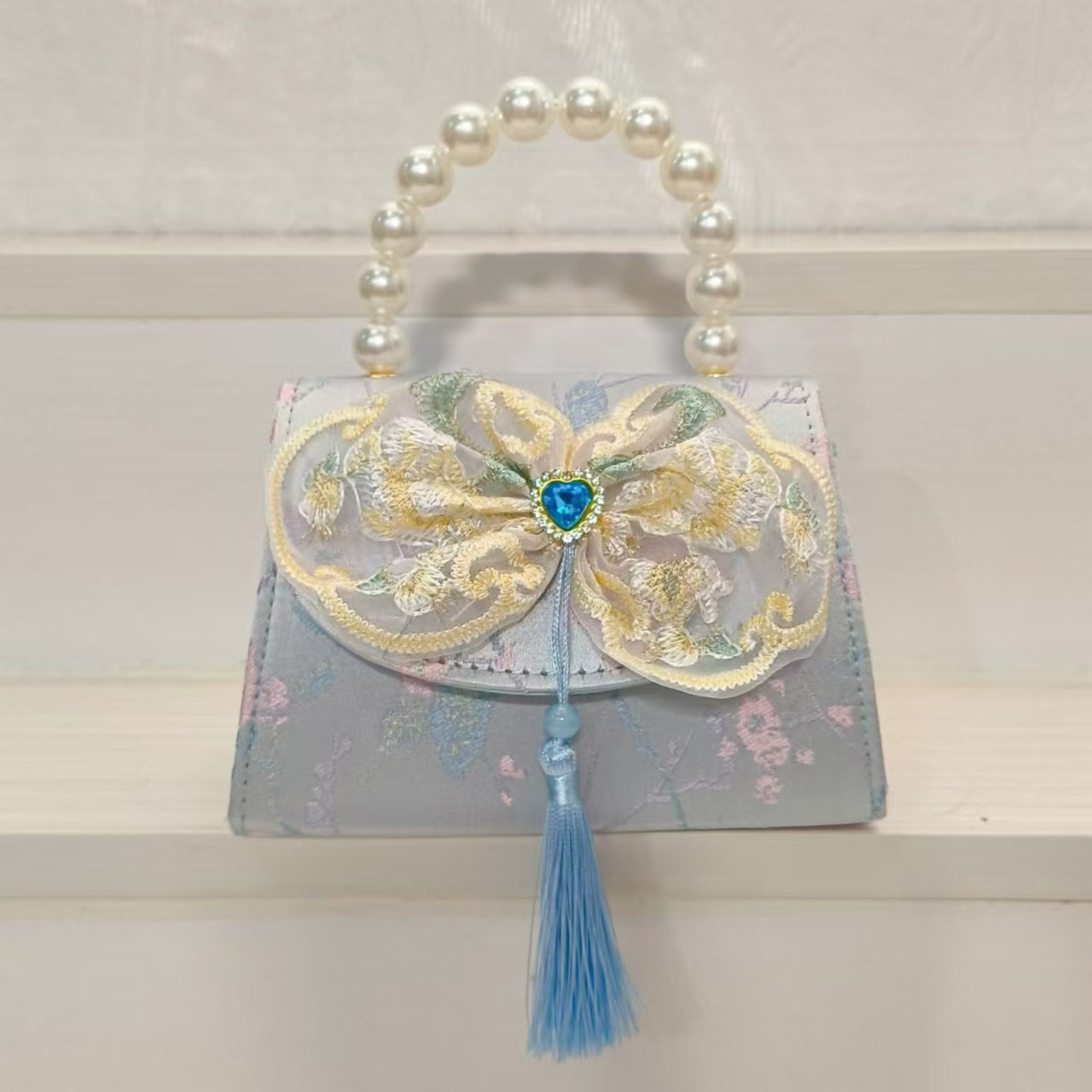 Bolsos de perlas de arco de estilo nacional, bolsos de cadena de princesa, bolsos de ropa antigua, accesorios para niños, bolsos de regalos para niñas