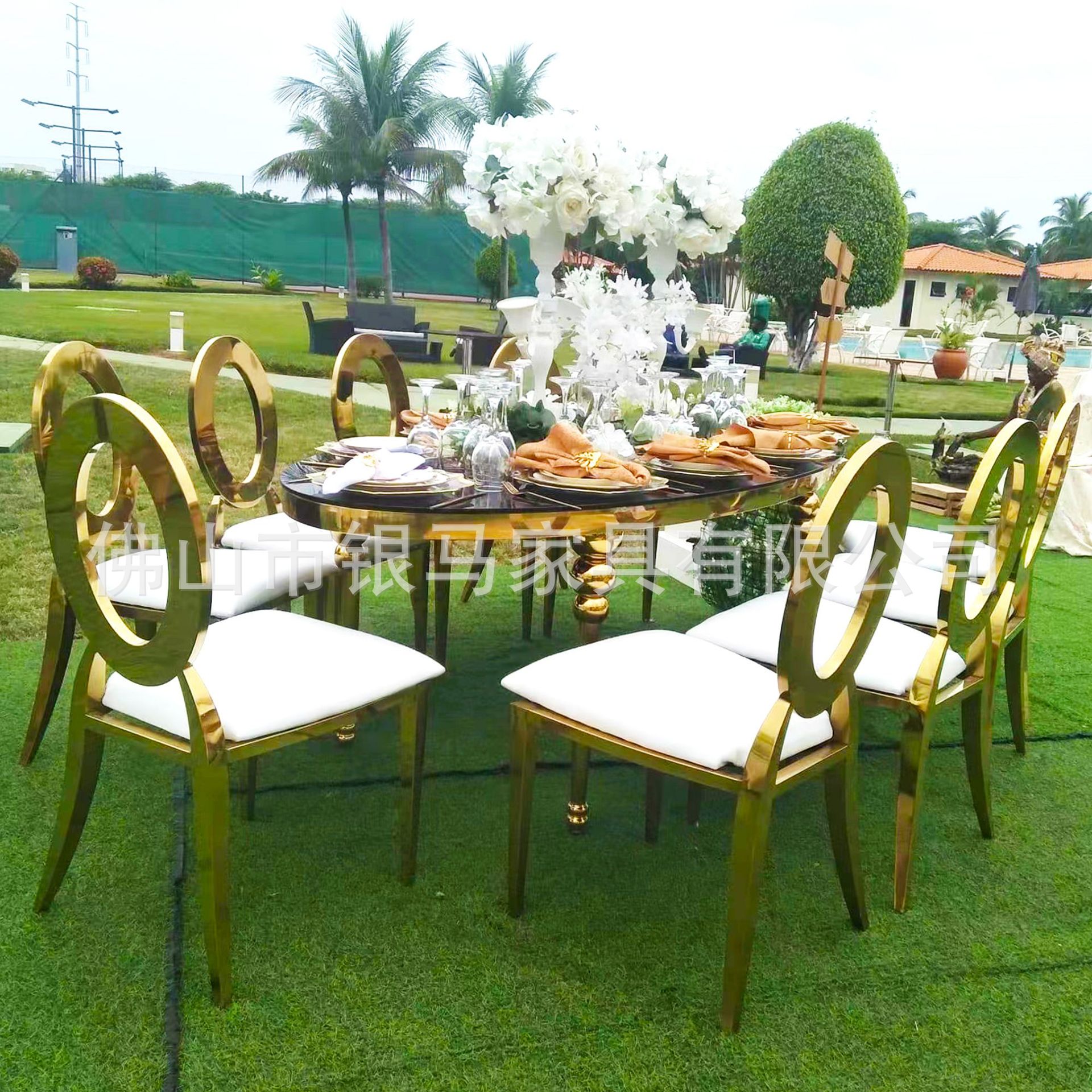 Fábrica al por mayor Hotel banquete boda comedor silla boda galvanoplastia Silla de acero inoxidable Bolsa De Oro suave Silla de comedor de cuero