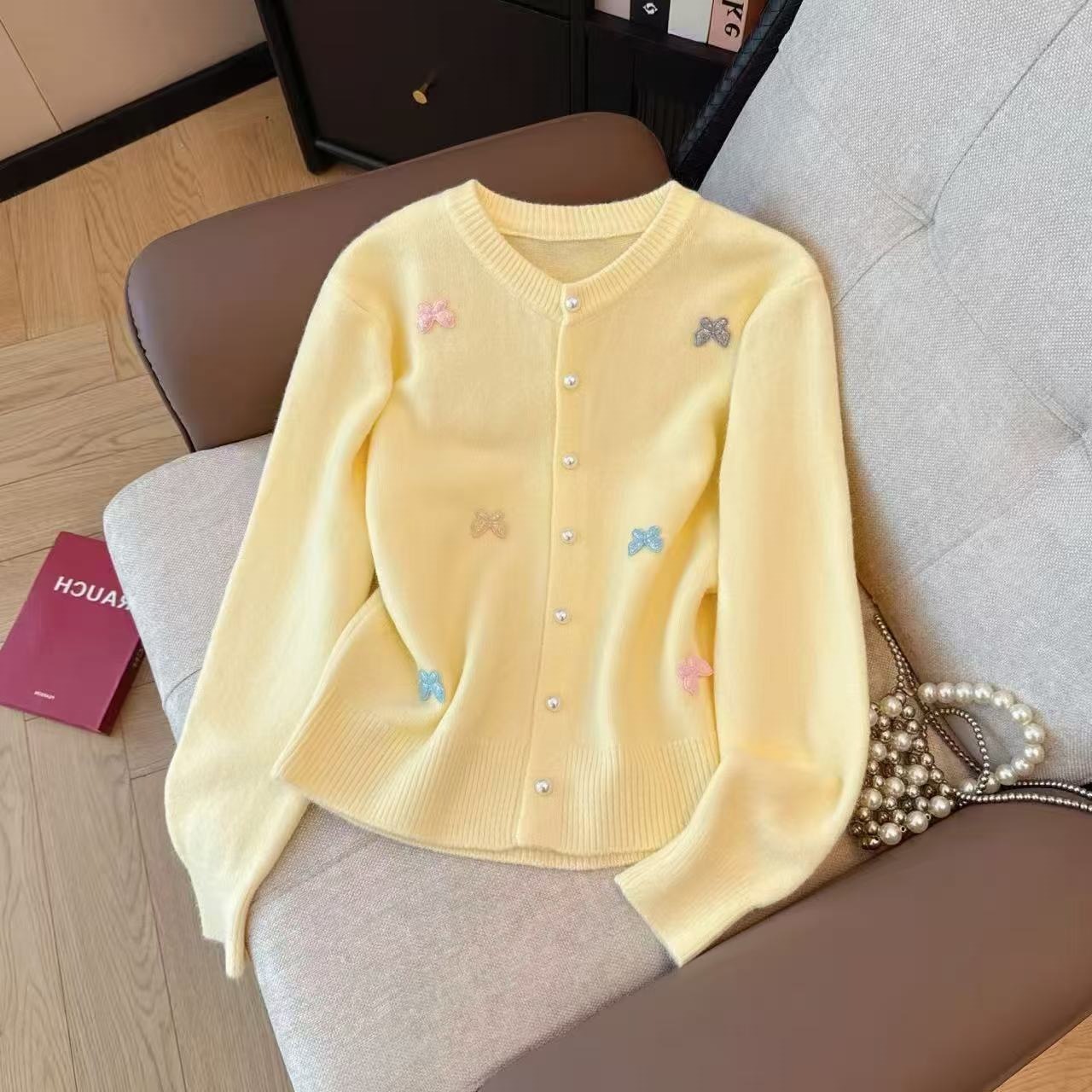 甜美风彩色蝴蝶结针织开衫女秋冬新款圆领珍珠扣宽松百搭毛衣外套