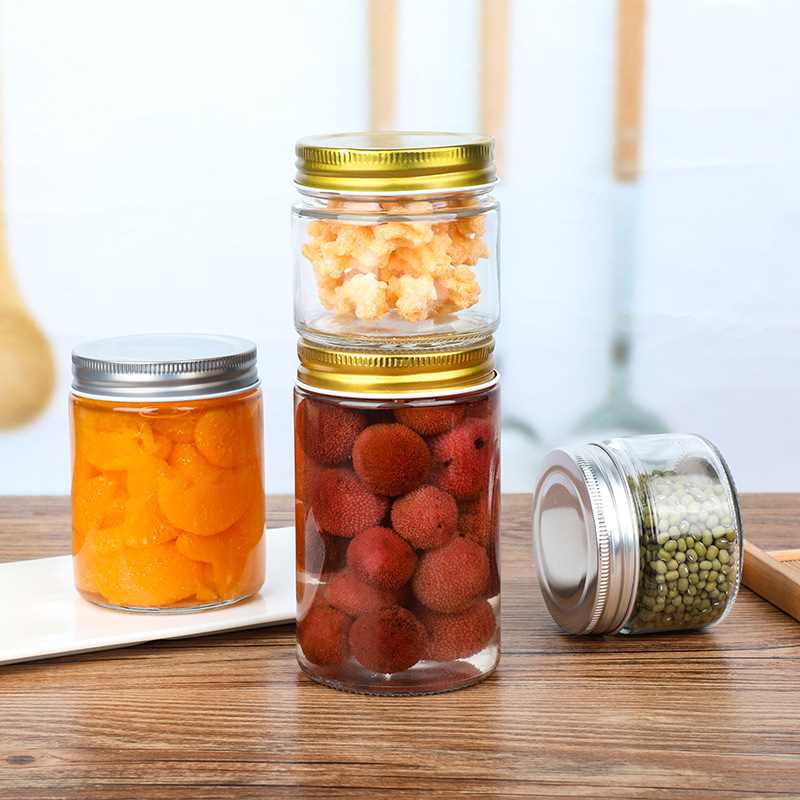 Botella de almacenamiento recta sellada puede botella engrosada transparente mermelada de vidrio botella de miel al por mayor encurtidos sub-botella