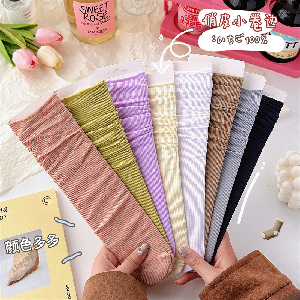 Calcetines de hielo calcetines de terciopelo de primavera y verano para mujer medias de media pantorrilla calcetines de JK largos blancos puros calcetines de moda al por mayor