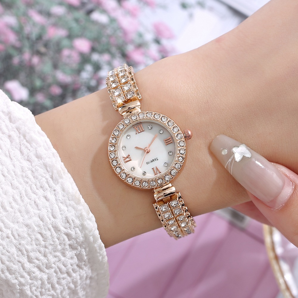 Nueva moda pequeño dial de diamante correa de acero de diamante reloj de mujer