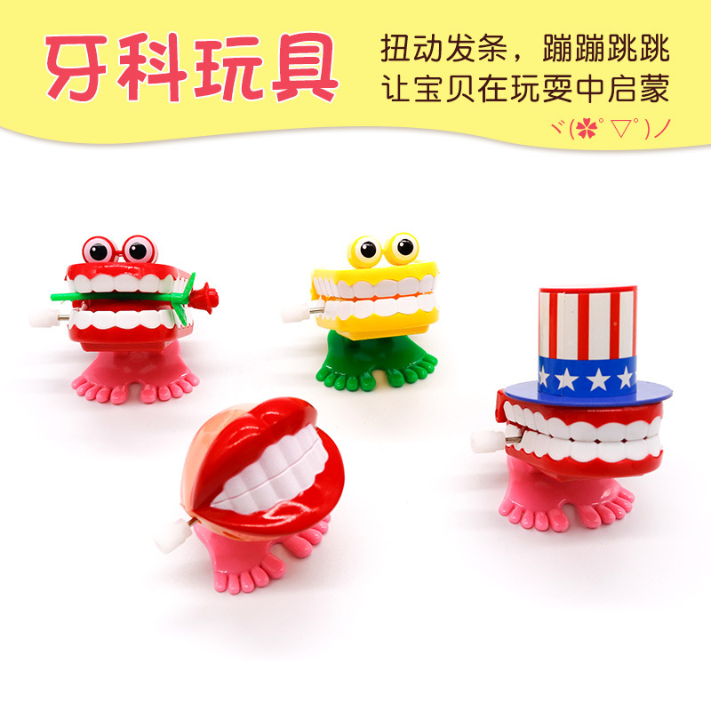Juguetes dentales dientes de salto juguetes para niños juguetes de relojería dientes en forma de dientes saltando Rana regalos de jardín de infantes