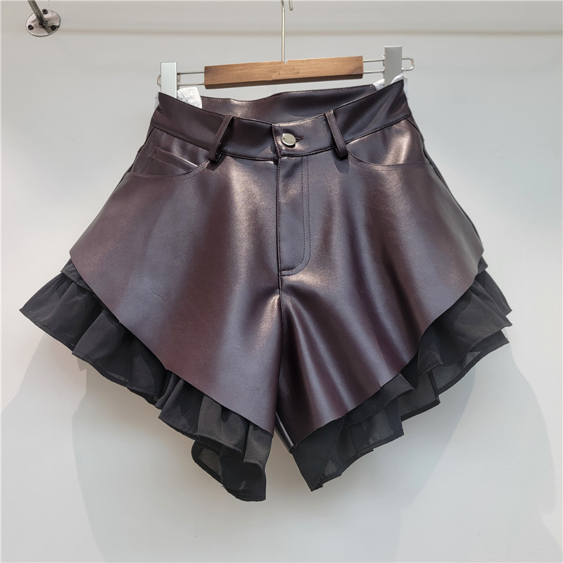 American-Style Sweet and Cool Faux Two-Piece Patchwork Leather Shorts, High-Waisted A-Line, Hip-Covering, Double-Layer Chiffon, Ruffled Edges, Loose Wide-Leg American-Style Sweet and Cool Faux Two-Piece Patchwork Leather Shorts, High-Waisted A-Line, Hip-Covering, Double-Layer Chiffon, Ruffled Edges, Loose Wide-Leg