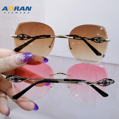Aoran frameless edge-cut trendy cat-eye sunglasses, personalized metal marine sunglasses, fashion street photography ins glasses
