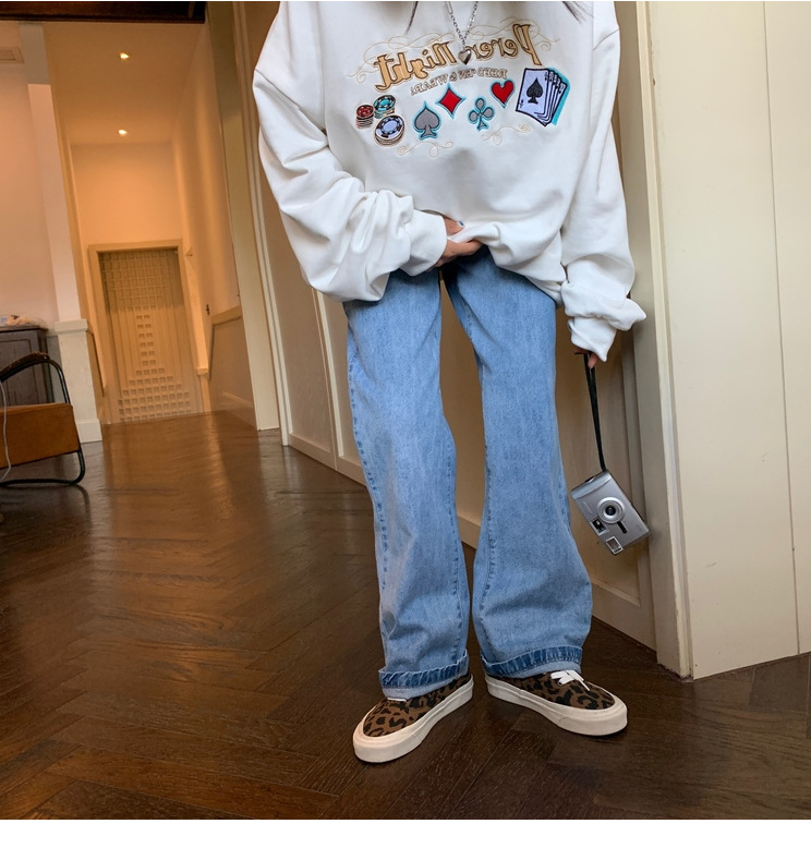 Sweater styled with accessories