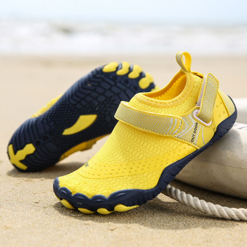 Nuevos zapatos de playa para niños al aire libre transfronterizos, zapatos de vadeo de cinco dedos, zapatos de buceo, zapatos de natación antideslizantes gruesos