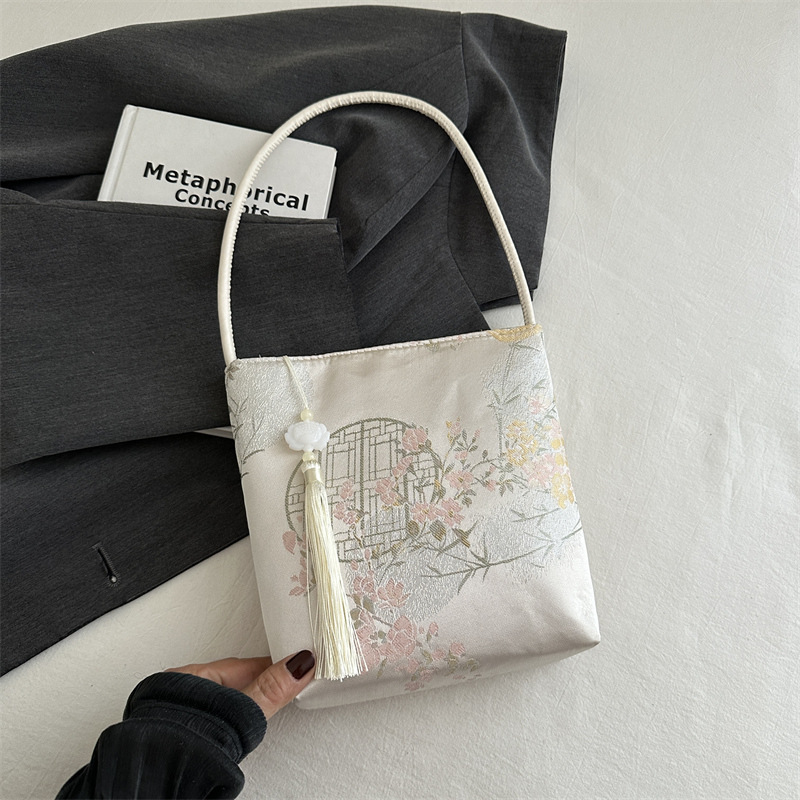 Guofeng shoulder bracket 2024 nuevo estilo de estilo chino nuevo estilo de seda alta sensación de borda shoulder tote para mujeres