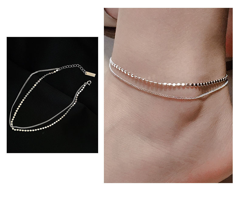 Cavigliera da donna con ciondoli a sole e dischi, gioiello moda_voghion.com