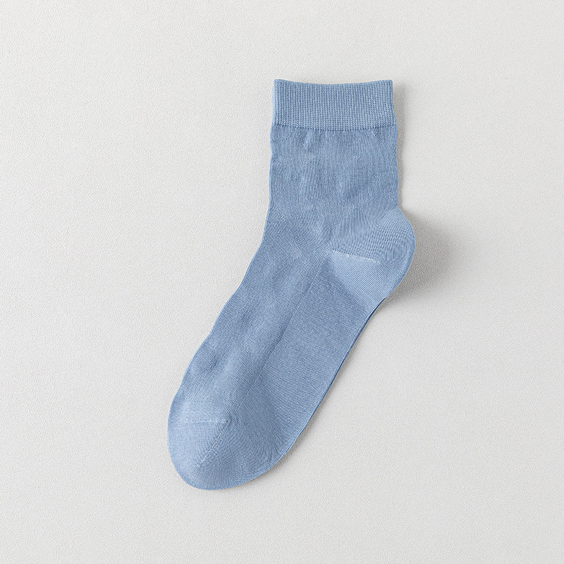 Calcetines de algodón de color sólido para hombres primavera y otoño medio tubo de diamante sin hueso transpirable absorción de sudor embalaje independiente calcetines de hombre al por mayor
