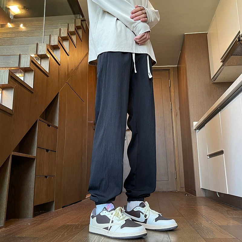 Мужские летние новые свободные драпированные спортивные штаны, модные повседневные джоггеры, универсальные длинные брюки с манжетами