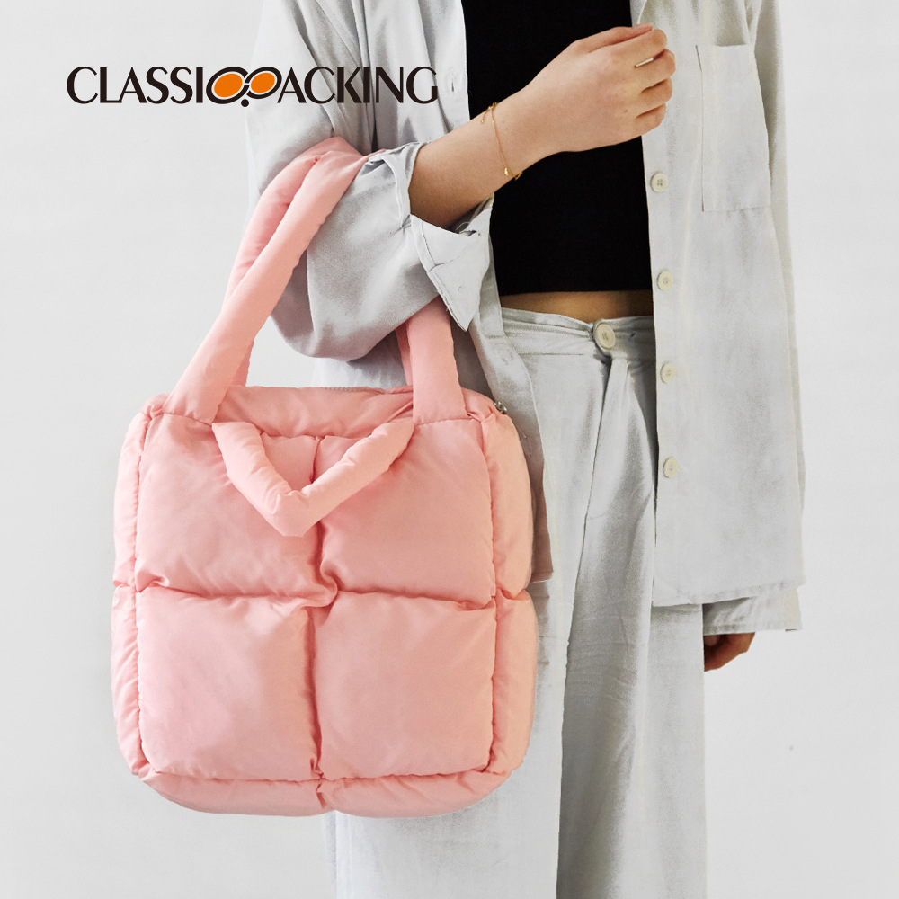 2023 nuevo bolso de otoño e invierno bolso de diseño de nicho bolso de mano lleno de algodón de Corea del Sur bolso de algodón acolchado de alta calidad chaqueta abajo bolsa