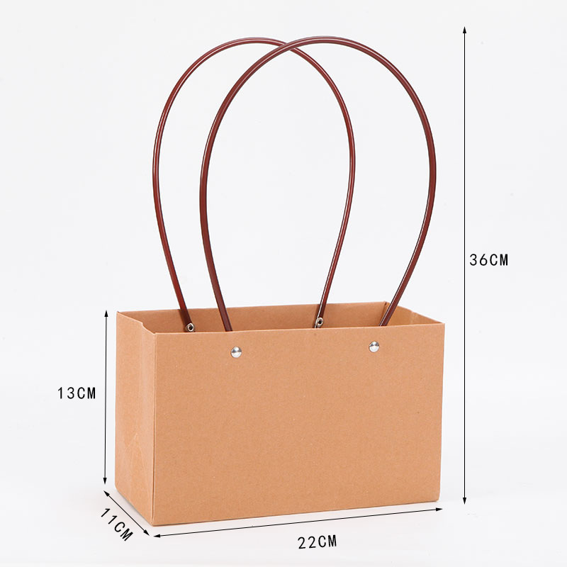 Gran cantidad y excelente precio de fábrica de ventas directas de todo tipo de película de plástico impermeable de papel Kraft bolsa de flores portátil diosa festival bolsa de ramo