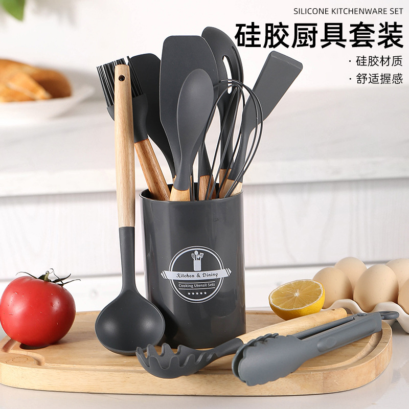 Fabricante spot mangos de madera utensilios de cocina de silicona utensilios de cocina antiadherentes utensilios de cocina utensilios de cocina de silicona de barril de almacenamiento juego de 12 piezas