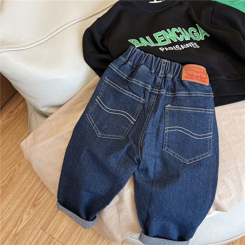 Niños 2026 nuevos jeans coreanos pantalones de niños primavera y otoño ropa guapo bebé de otoño pantalones largos versátiles