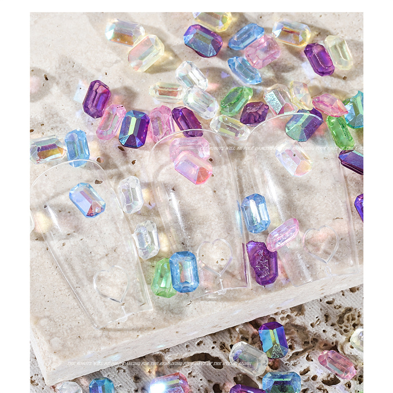 Online Celebrity Nail Candy Diamond Jewelry resina tridimensional Aurora color mágico largo octogonal en forma de diamante de uñas al por mayor 100 piezas