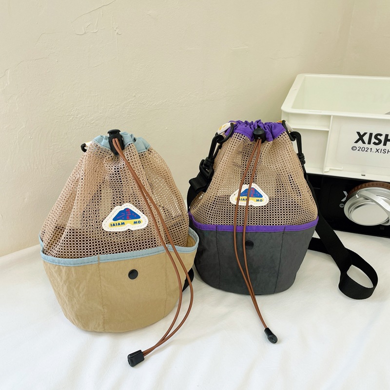 Mochila de hombro para niños y niñas con cuerda extranjera, malla de empalme plegable, mochila de hombro para niños, nueva mochila de playa para niños