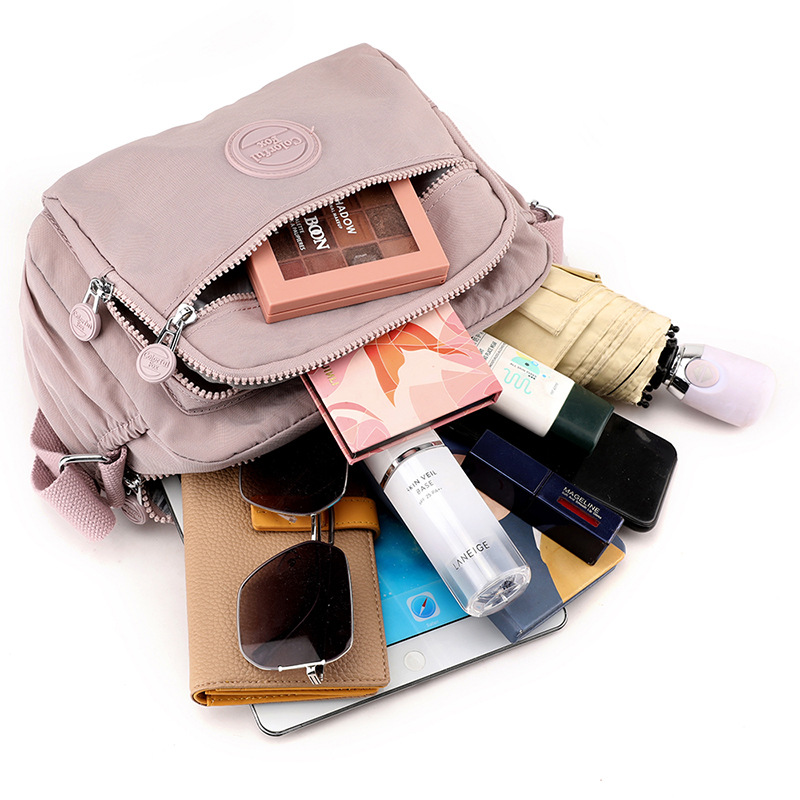 2025 nuevas tendencias de moda de las mujeres bolsos de hombro, bolsos de ocio al aire libre, bolsos simples de varios pisos