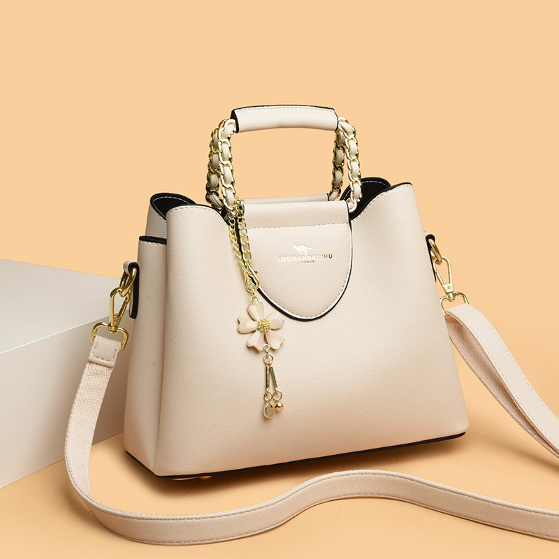 Nueva moda de hombro de las mujeres costura pequeño tamaño exquisito cubo bolsa de gran capacidad de cuero suave de una sola pieza de entrega para mamá más joven