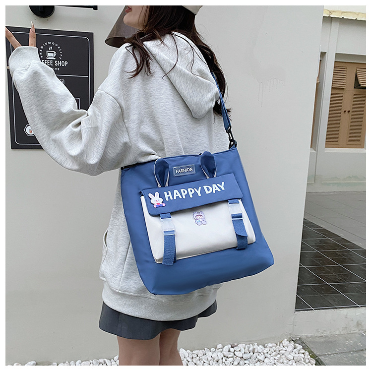 Large-capacity file bag, primary school student handbag that can be carried on one shoulder, book bag for girls with high appearance standards, homework books and test papers bag undefined