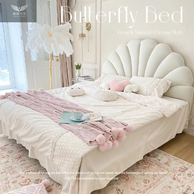 Cama de lujo ligera moderna y simple dormitorio principal cama de aire de crema cama de tecnología cama de tela cama de pétalos rojos cama de niña cama princesa