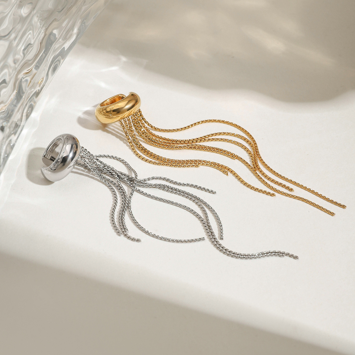 Wanxing Pendientes de borla de acero inoxidable europeo y americano sin orejas perforadas Pendientes de lujo ligero de alta calidad Joyas transfronterizas de acero de titanio