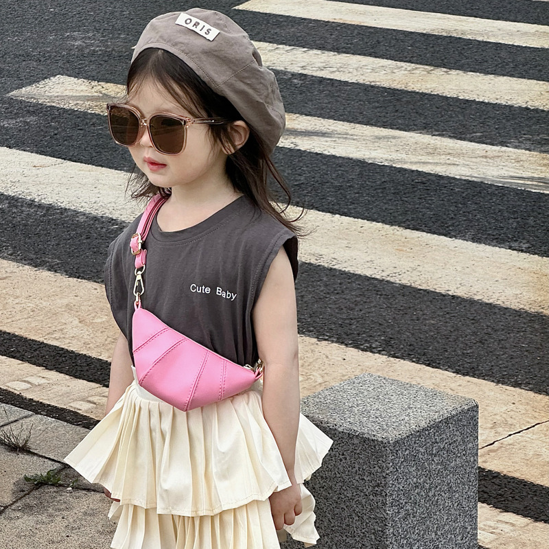 Bolsa de hombro coreana para niños y niñas, moda de color sólido creativa, forma de cuerno de buey, bolso para niños, nuevo tipo de bolso para niños de comercio exterior