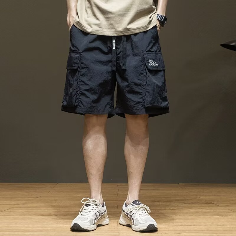 速乾工装半ズボン男の夏のファッションはゆったりとしています。|undefined