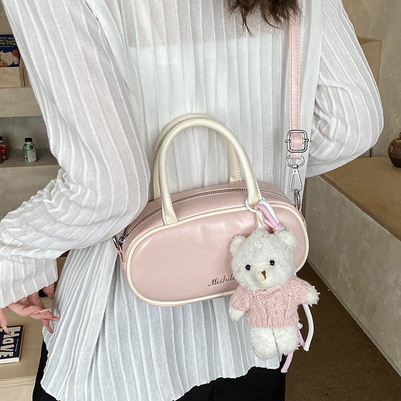 Bolsa de hombro coreana para niños y niñas simple de color sólido bolso de mano pequeño bebé adorable colgante bolso de accesorios para niños