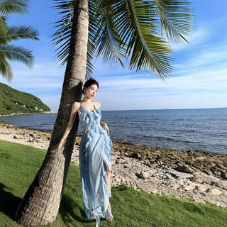 度假风吊带连衣裙女夏日清冷感海边不规则露腰荷叶边长裙