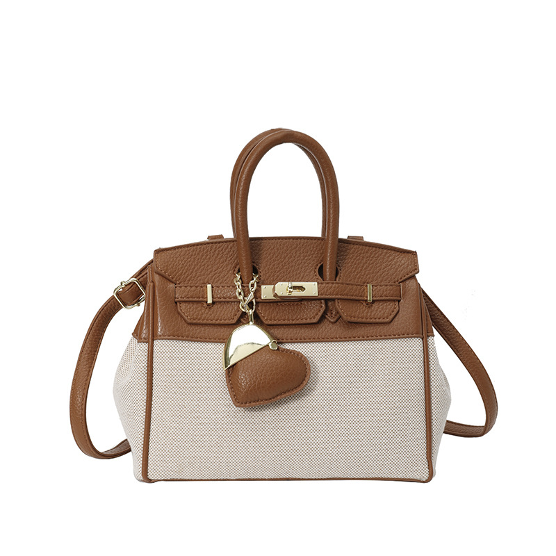 Bolso de tela de mujer color contrastante empalme bolso portátil Kylie bolsa de gran capacidad transfronteriza alta sensación de viaje bolsa de mano