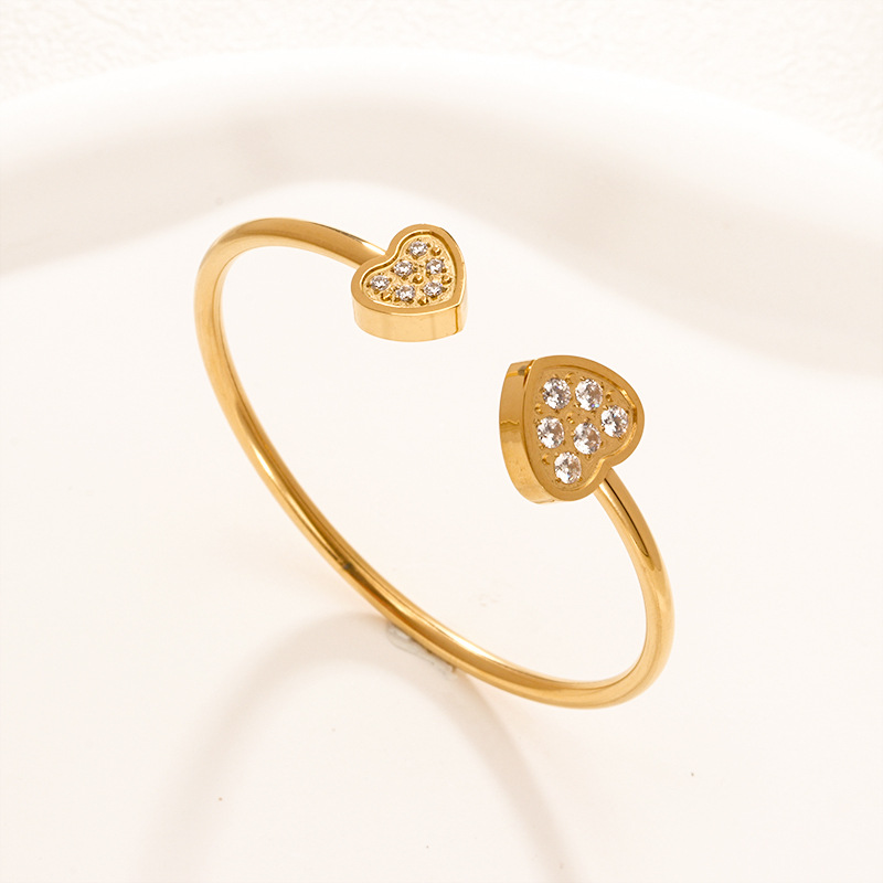 Fábrica en stock al por mayor de Europa y América transfronteriza de acero inoxidable en forma de C pulsera abierta ajustable chapado en oro 18K personalidad no se desvanece