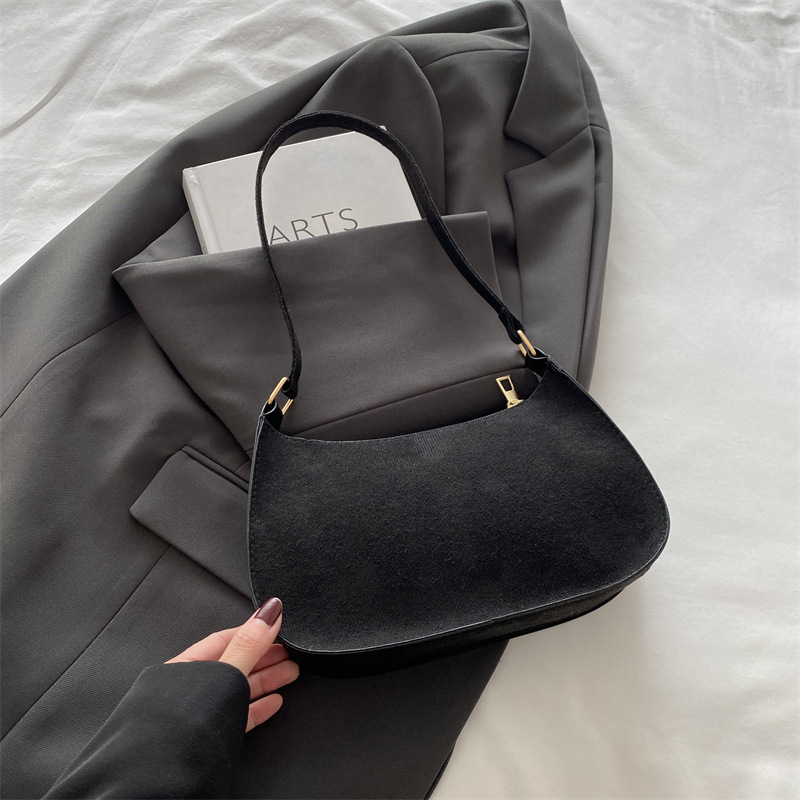 2024 invierno nuevo estilo de nicho de estilo retrógrado diseño de alto valor de la personalidad portátil de hombro de moda casual bolsas axilales