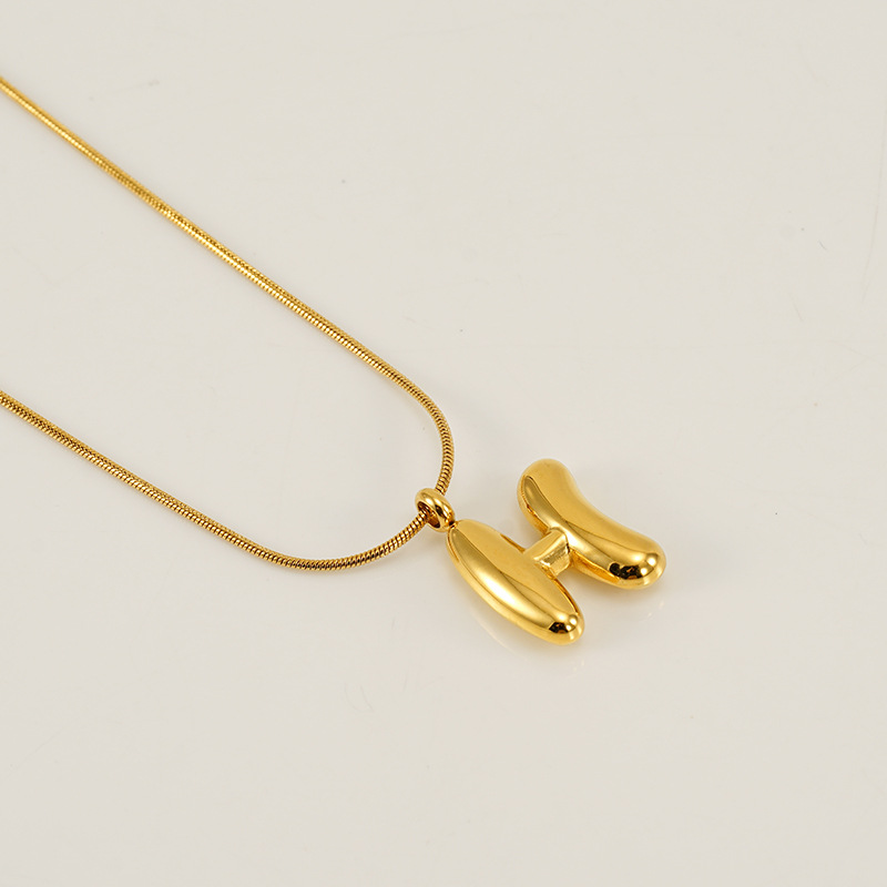 Burbujas transfronterizas 26 letras inglesas colgante brillante collar nicho universal oro acero titanio joyería collar