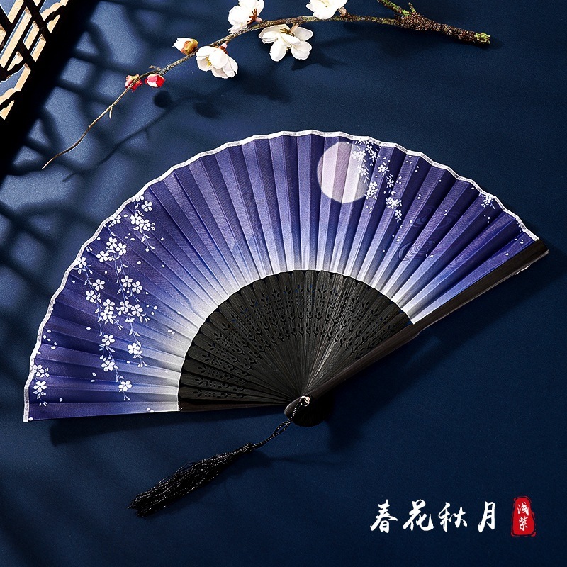 古代のチャイナドレスの女性の漢服の子供のダンスの桜の扇の中国風の夏は桃の花の扇子を身につけて古風を扇に折ります。|undefined