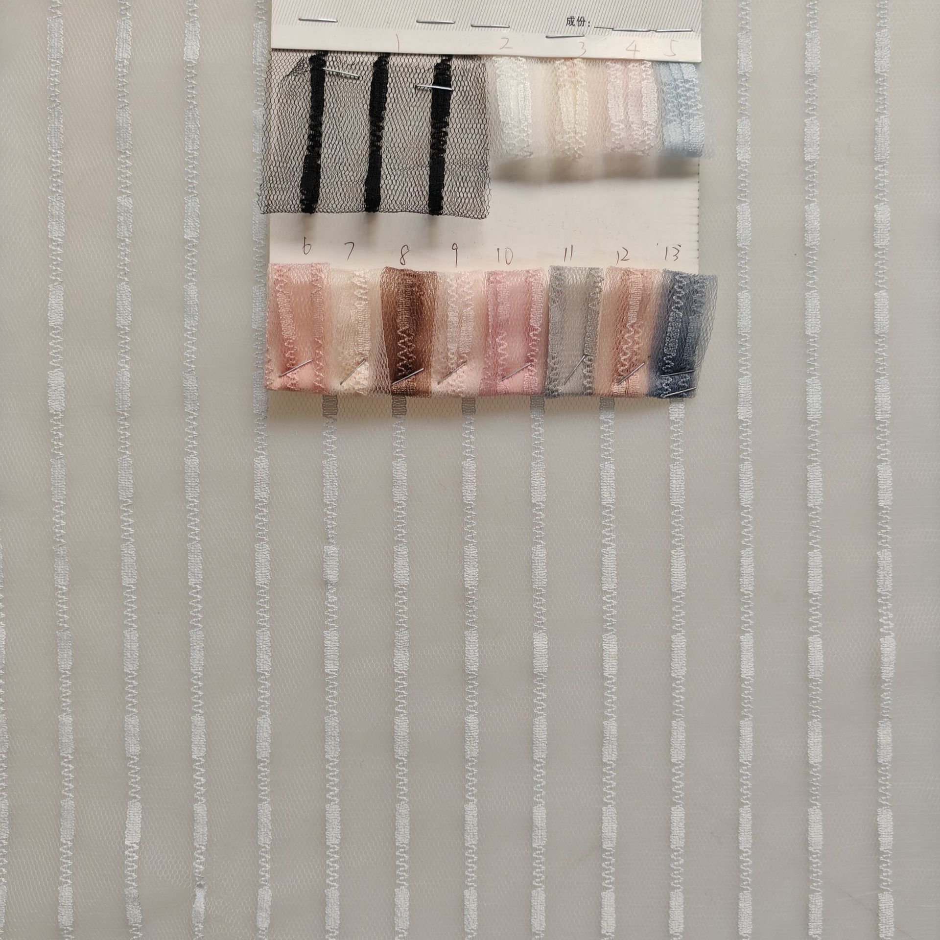 新款热卖~薄透款锦纶无弹竖纹小条子波浪线提花网纱 时装辅料面料