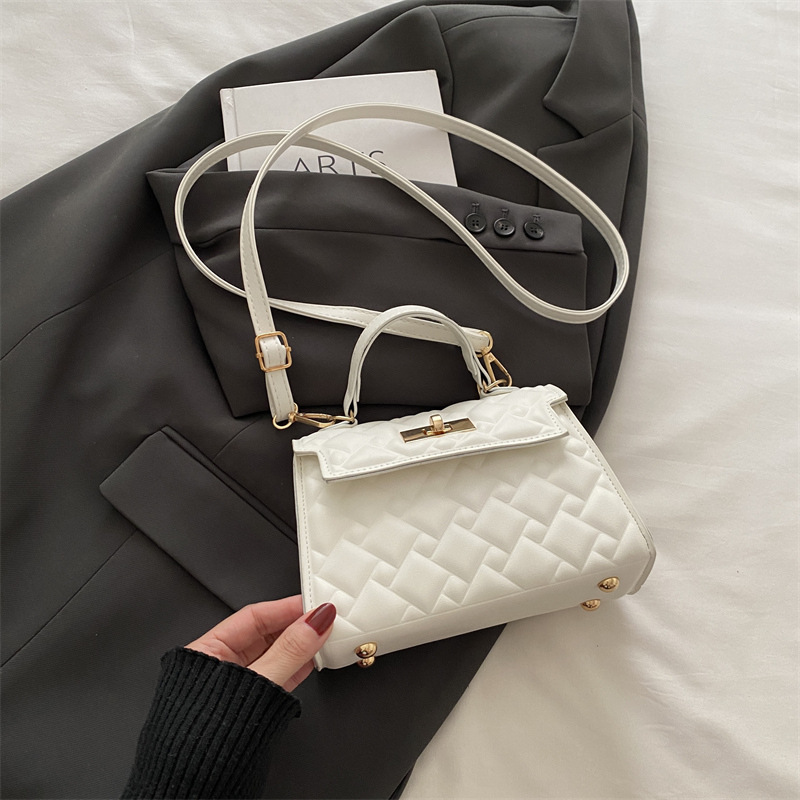 Bolso de mano con cerradura de cercanías para mujer 2024 otoño e invierno nuevo estilo salvaje ins diseño de nicho bolso salvaje ins Kelly