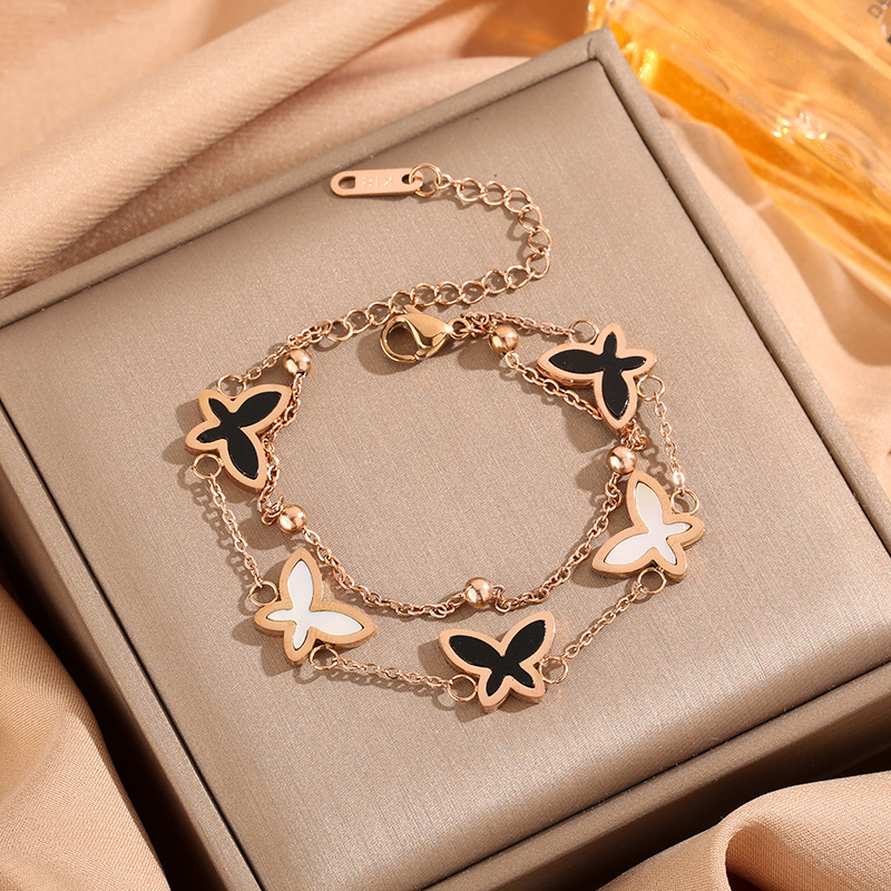 Estilo coreano blanco y negro Concha mariposa pulsera de oro rosa geométrica de doble capa pulsera de acero de titanio fábrica de joyas para niñas