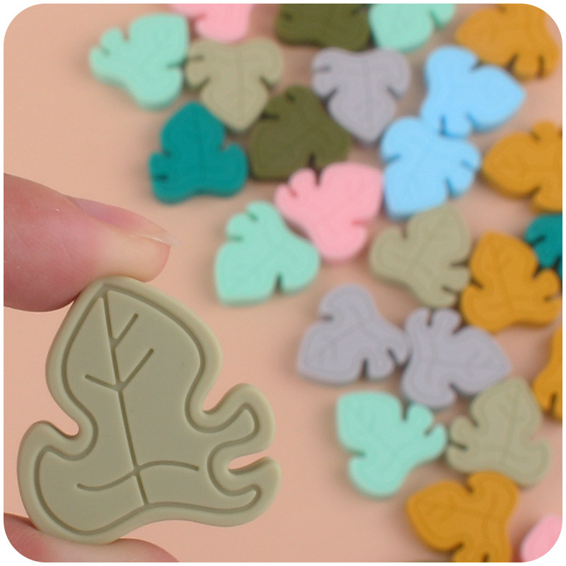 Bebé suministros de dibujos animados cuentas hoja de silicona DIY bebé mordedura chupete cadena mordedor pulsera accesorios de juguete