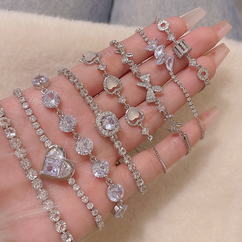 Nueva pulsera de perlas coreana, todo fósforo de nicho, sentido de alta gama, exquisita pulsera de amor de circón, pulsera de lazo de temperamento