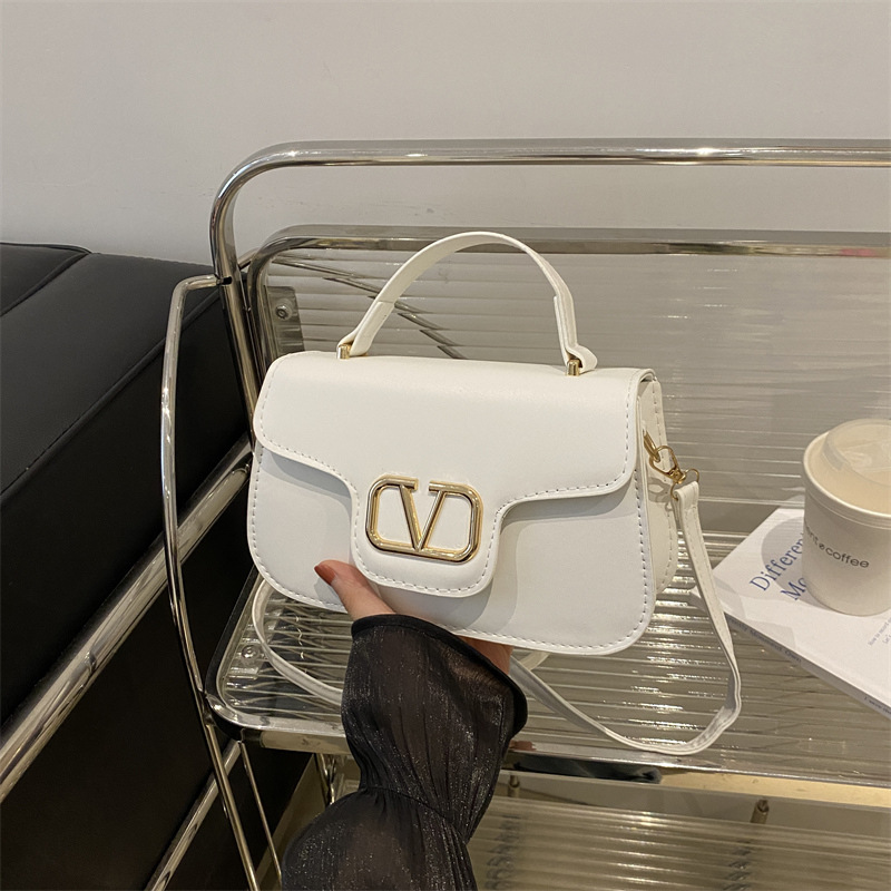 Textura de alta calidad Cadena de gas extranjero Bolso de locomotora de charol Mujer 2024 Nuevo nicho Bolso cuadrado pequeño de mensajero de un solo hombro