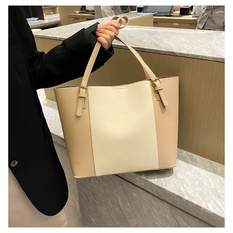 Bolsos de viaje de atmósfera simple mujeres maduras primavera nuevo estilo extranjero de gran capacidad de hombro bolso de mano retro