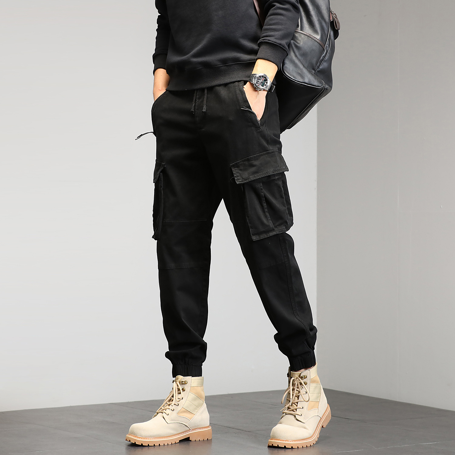 Joven hombre otoño nuevos pantalones de trabajo, pantalones casuales, pantalones de bolsillo simples, ropa de hombre elástica