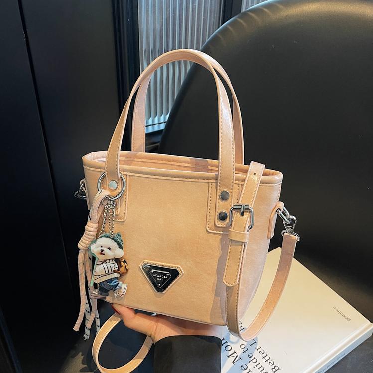 Paquete portátil de cuero de cera de aceite de alta calidad para mujeres 2025 nuevo estilo coreano bolso de hombro de estilo extranjero bolso retro versátil